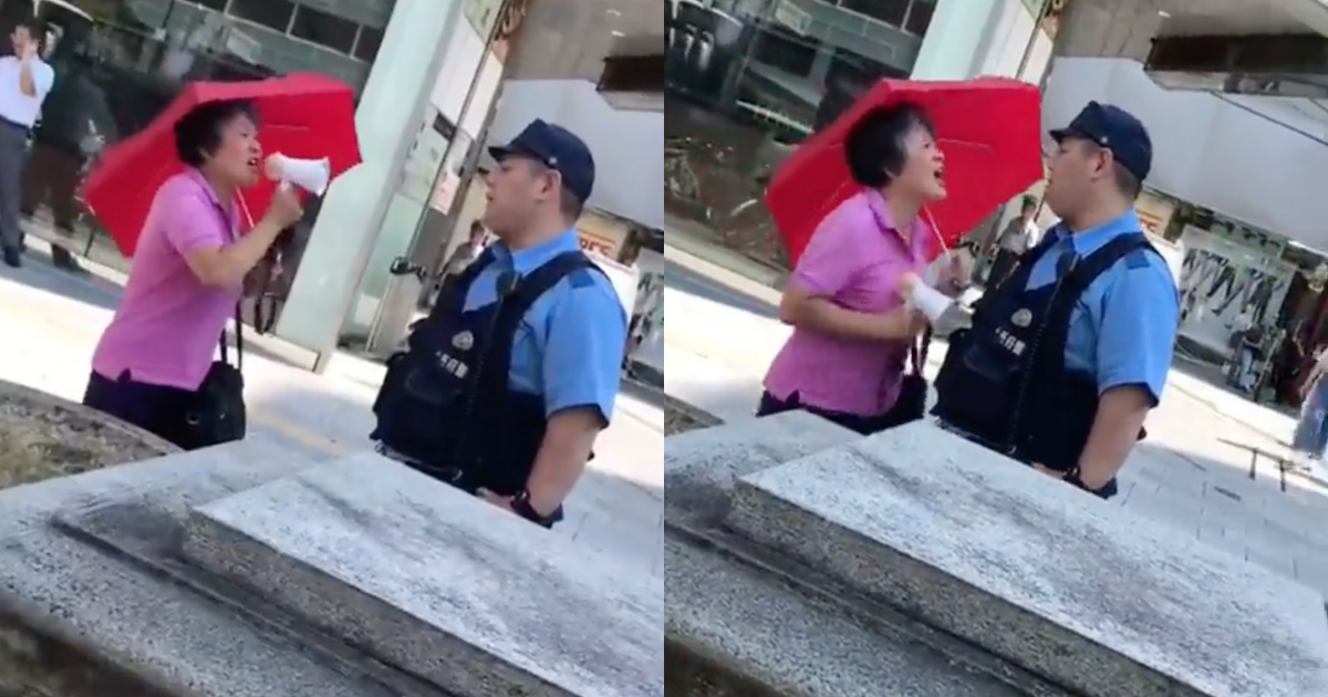 中國大媽拿大聲公近距離對日本警察大吼。（翻攝自推特@kisyo_story）