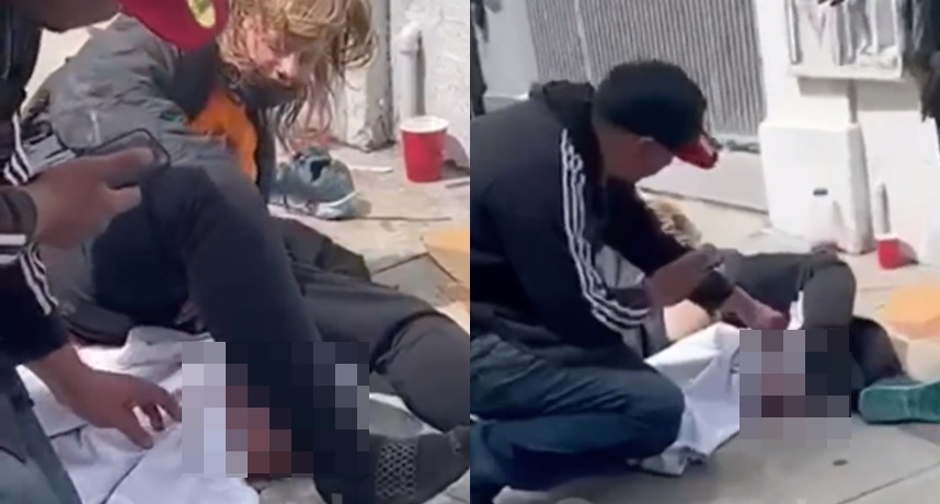 婦女在人行道生下嬰兒隨後被送往醫院,震撼影像瘋傳。(翻攝自推特)