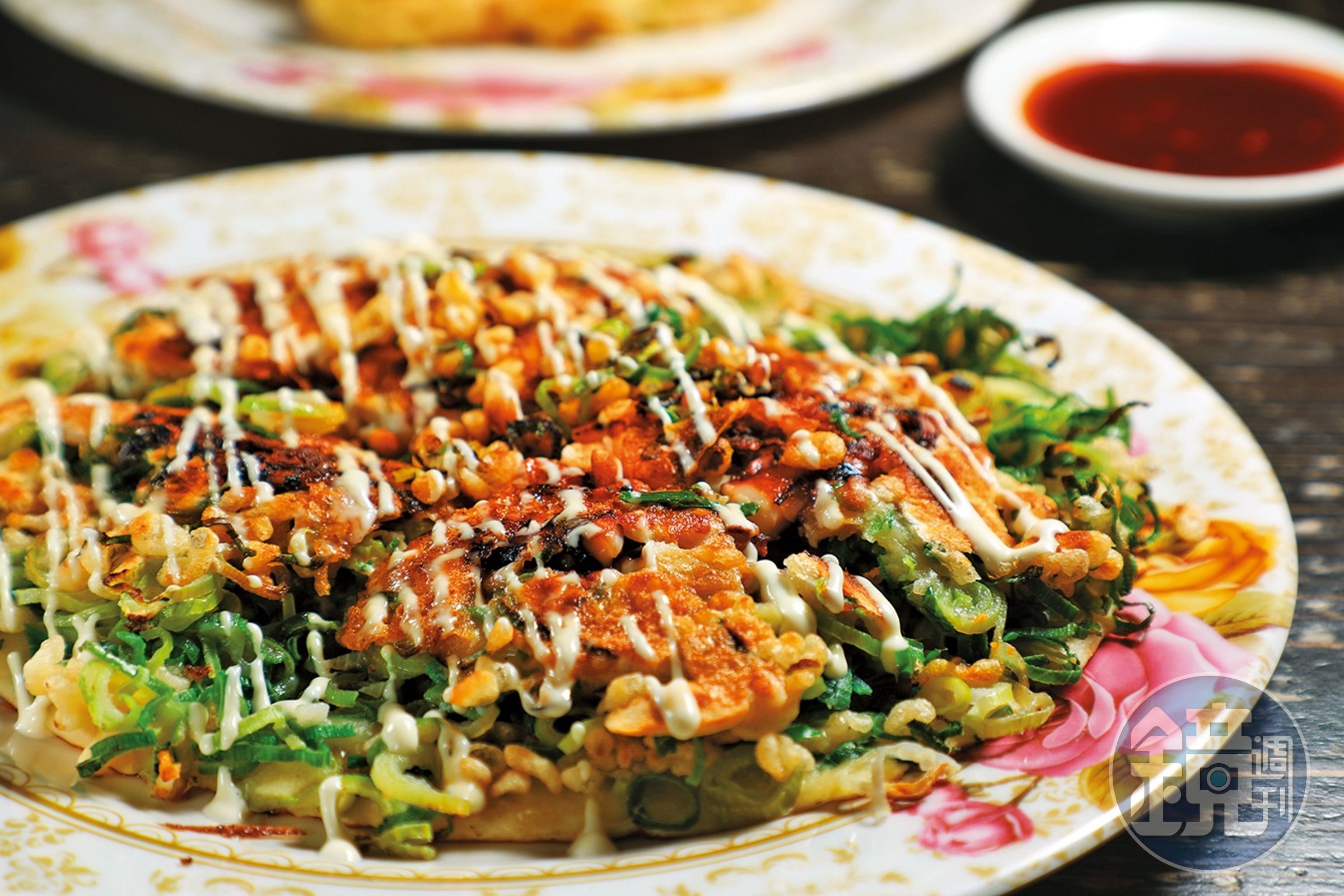 章魚口味的「青蔥燒」,餅皮焦黃香脆。(1,080日圓/份,約NT$251)