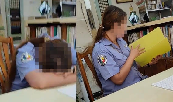 女保全上班時間趴在桌上睡覺，讓一名男住戶不滿，故意上前討看財務報表。（翻攝臉書社團「爆料公社」）