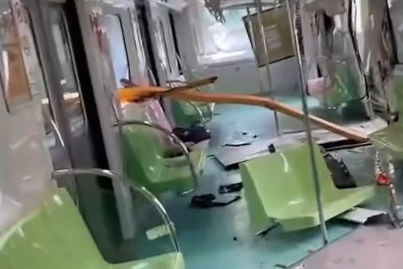 台中捷運車廂遭附近建案吊臂砸穿，造成1死8傷悲劇。（翻攝自記者爆料網）