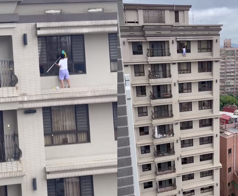 有網友錄下一段驚悚影片，一名婦人在無防護措施下，站在15層樓高的窗外擦窗。（翻攝自爆廢公社）