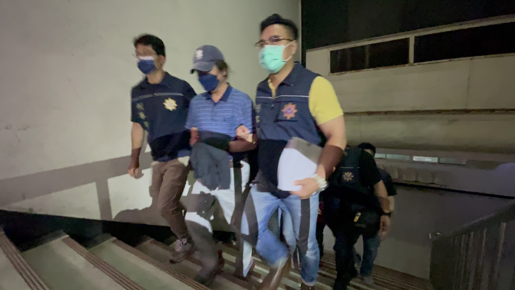 前行政院政務顧問陳振坤涉im.B吸金案,今拘提其到案。
