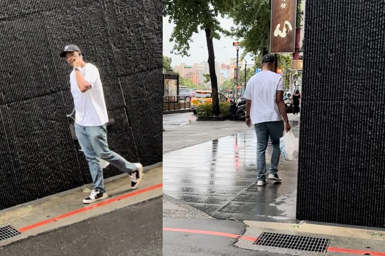 本刊直擊黑人雖然一身輕便出門採買，但是警戒心頗高。