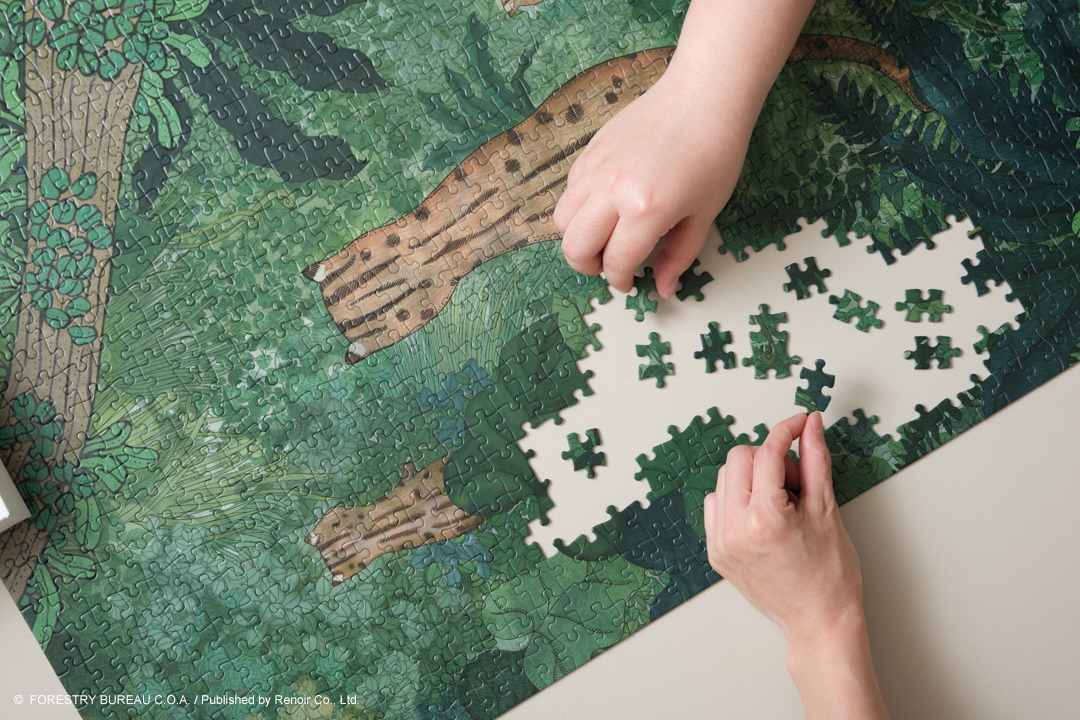 林務局與雷諾瓦國際有限公司聯名推出《石虎山林漫步》拼圖。（林務局提供）