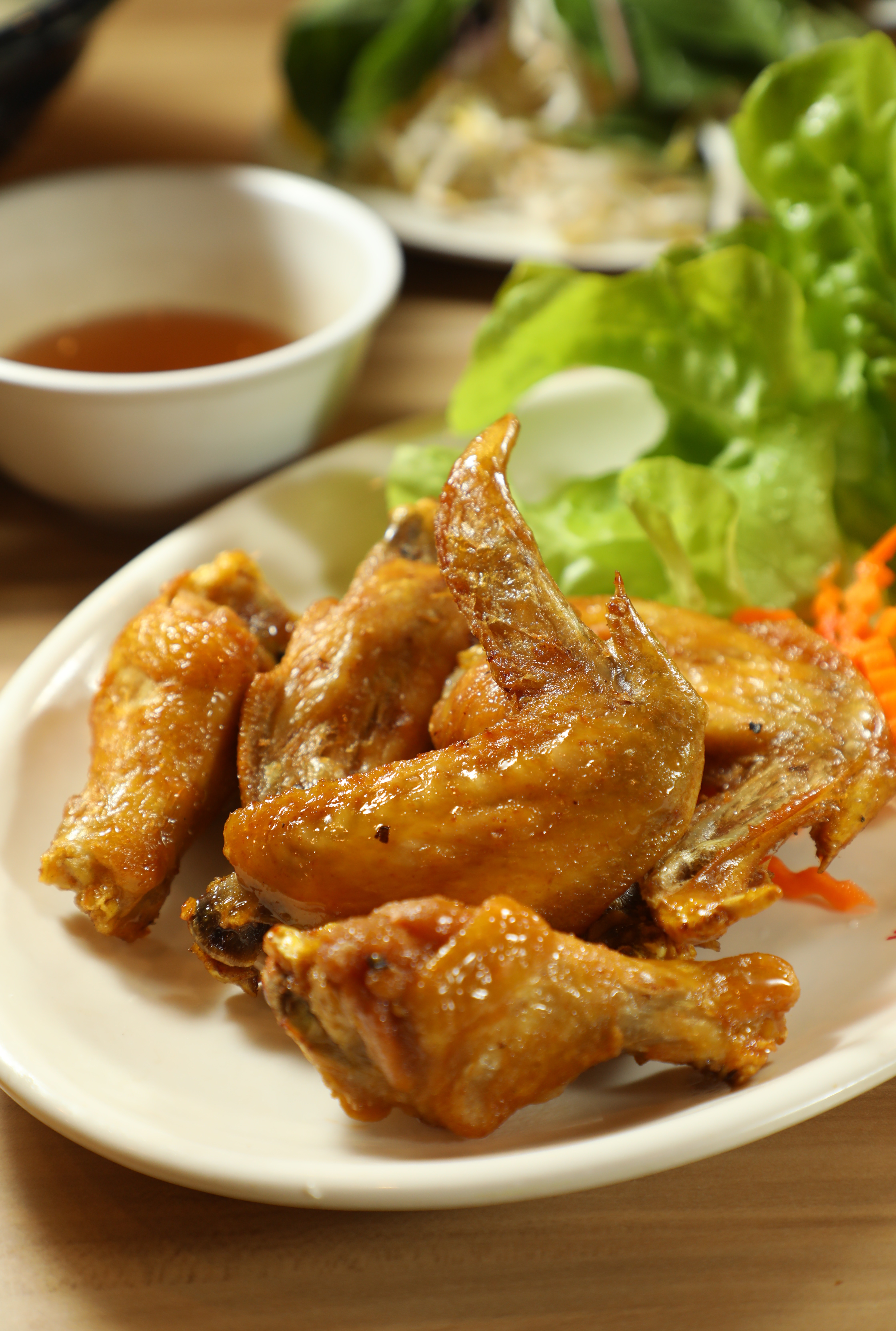 想打牙祭的話也可以點味道很乾淨的「魚露炸雞翅」。（澳幣15元／份，約NT$312）
