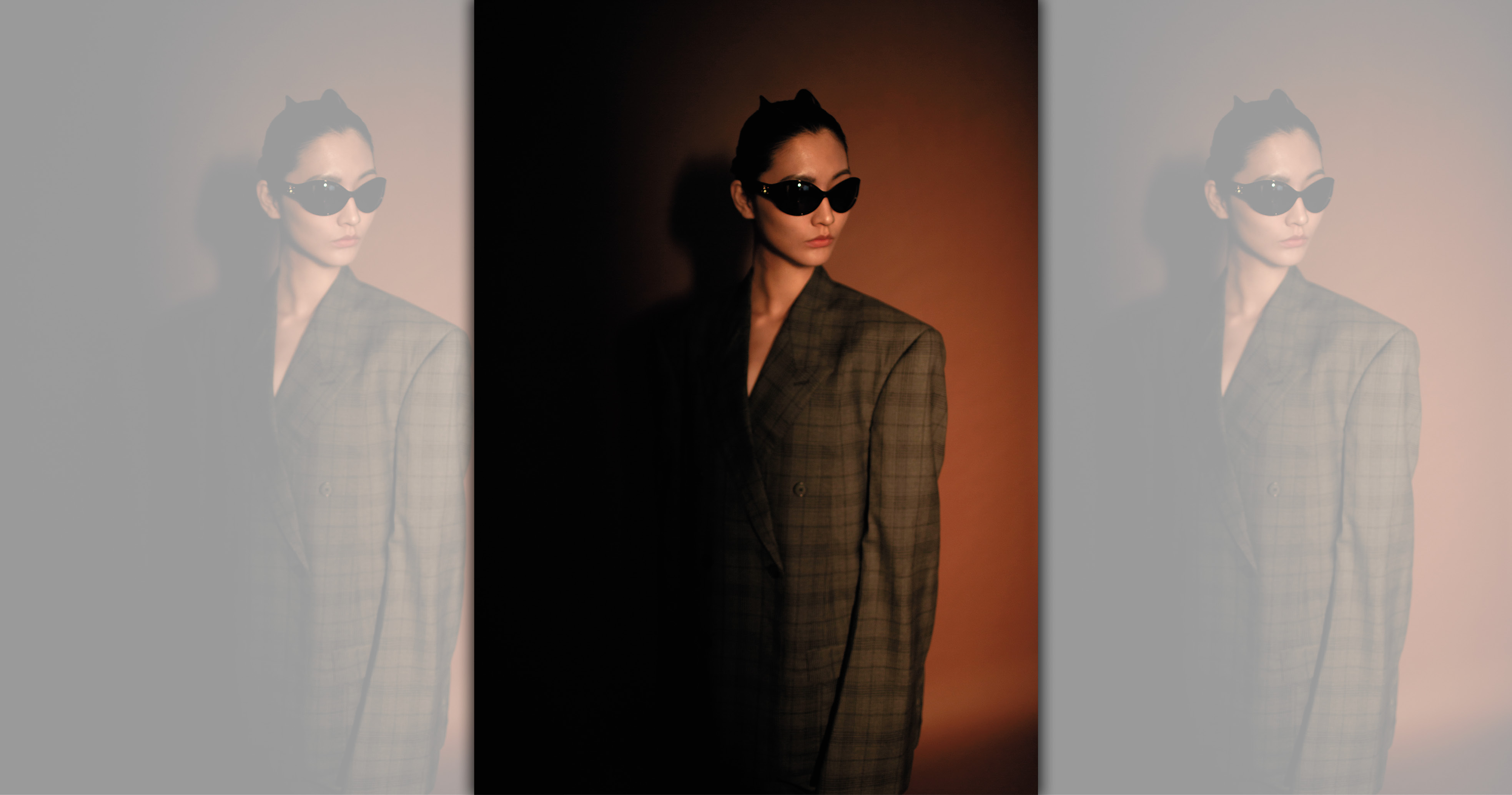 灰色剪裁格紋解構外套 NT$138,350 by BALENCIAGA；灰色剪裁格紋解構短褲 NT$57,700 by BALENCIAGA；TRIOMPHE 11太陽眼鏡 NT$16,250  by CELINE BY HEDI SLIMANE。