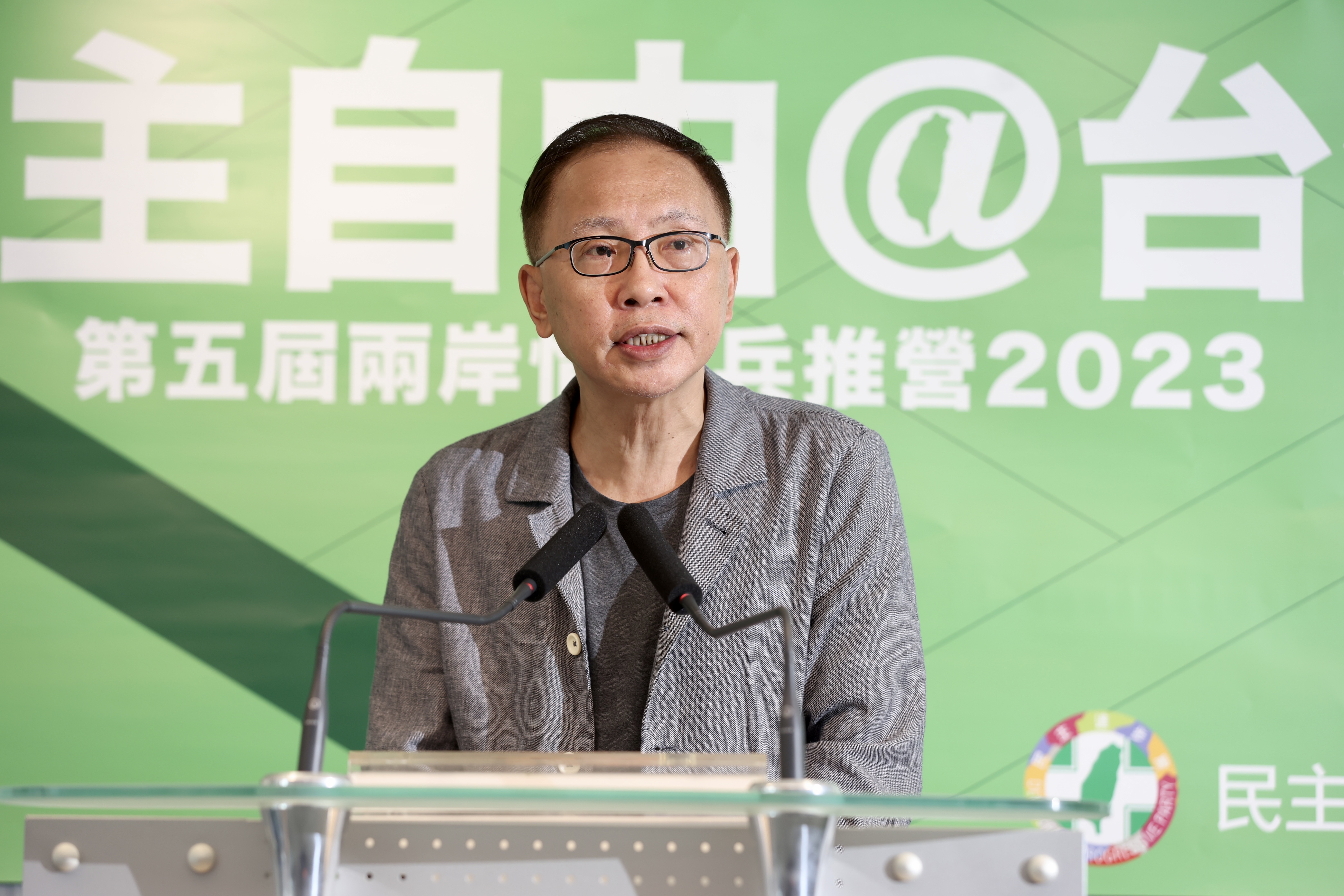 中央警察大學教授、民進黨中國部前主任董立文出席記者會。(民進黨提供)