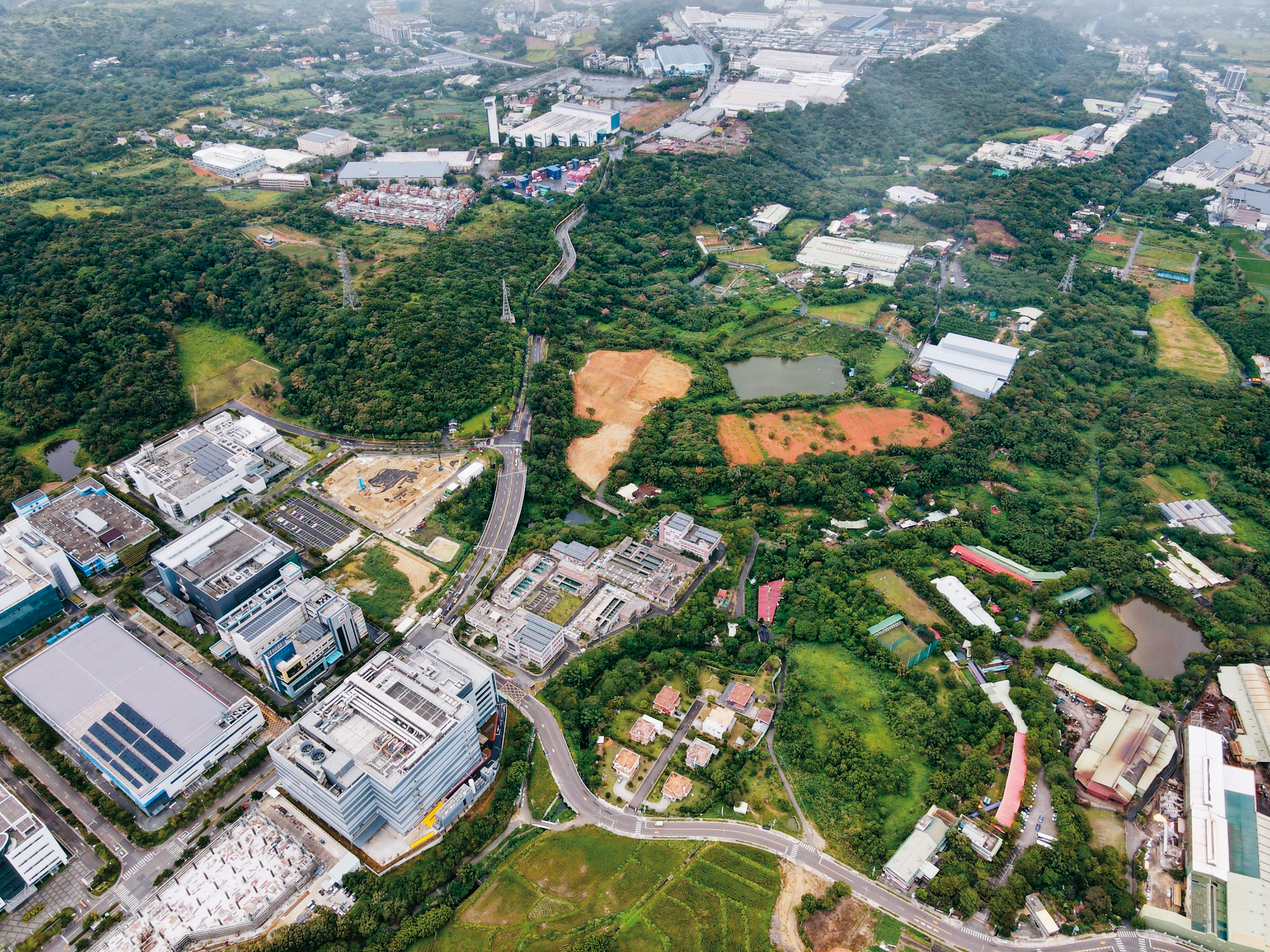 龍潭三期擴建計畫引發居民抗爭，國科會主委吳政忠表示，台積電表達會接受擴大計畫微調。