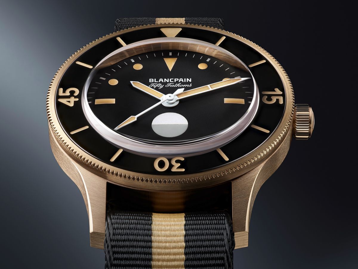 BLANCPAIN 寶珀發表「五十噚」70週年第三幕紀念錶，以「青銅金」材質製作，並且在面盤6點鐘位置設了一個圓形的MIL-SPEC「濕度指示器」功能。全球限量發行555枚，定價為NT$1,022,000。