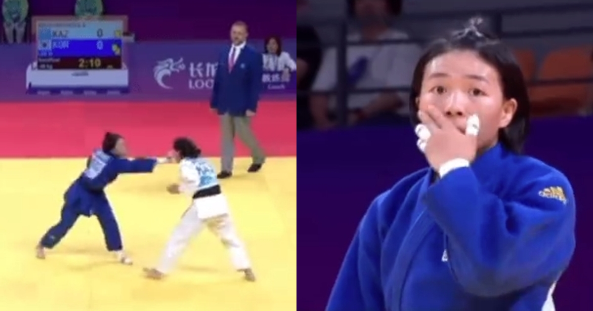 李慧卿（藍衣者）在比賽中賞了對手一巴掌，自己也傻眼。（翻攝自微博）