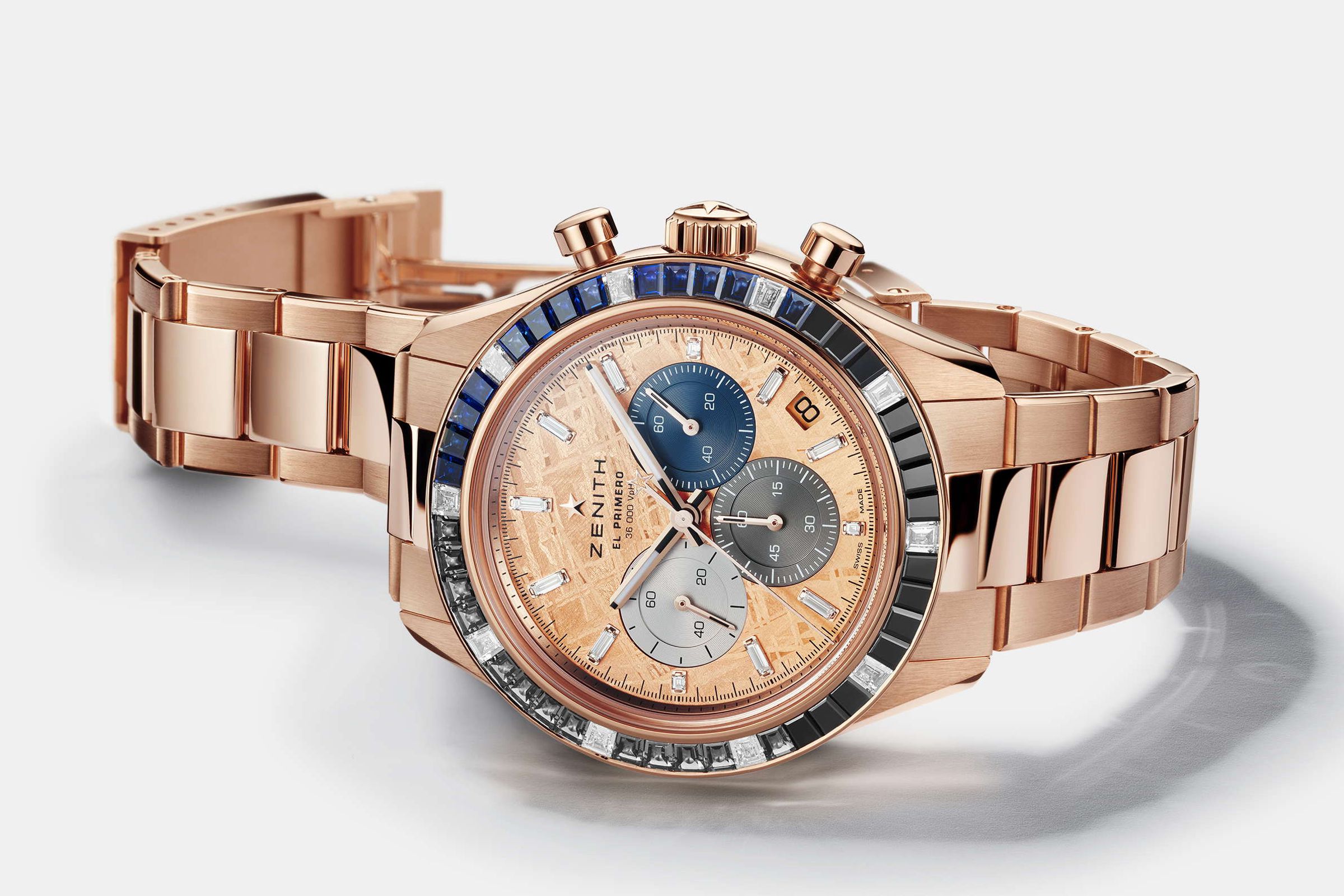 ZENITH Chronomaster Sport Precious/尺寸:41mm/材質:18玫瑰金/功能:時、分、小秒、日期指示;計時碼錶功能/機芯:El Primero 3600型自動上鍊機芯/錶圈鑲有藍寶石、鑽石和尖晶石,長方形切割鑽石時標,寶石總共約5克拉/定價:NTD 3,297,300