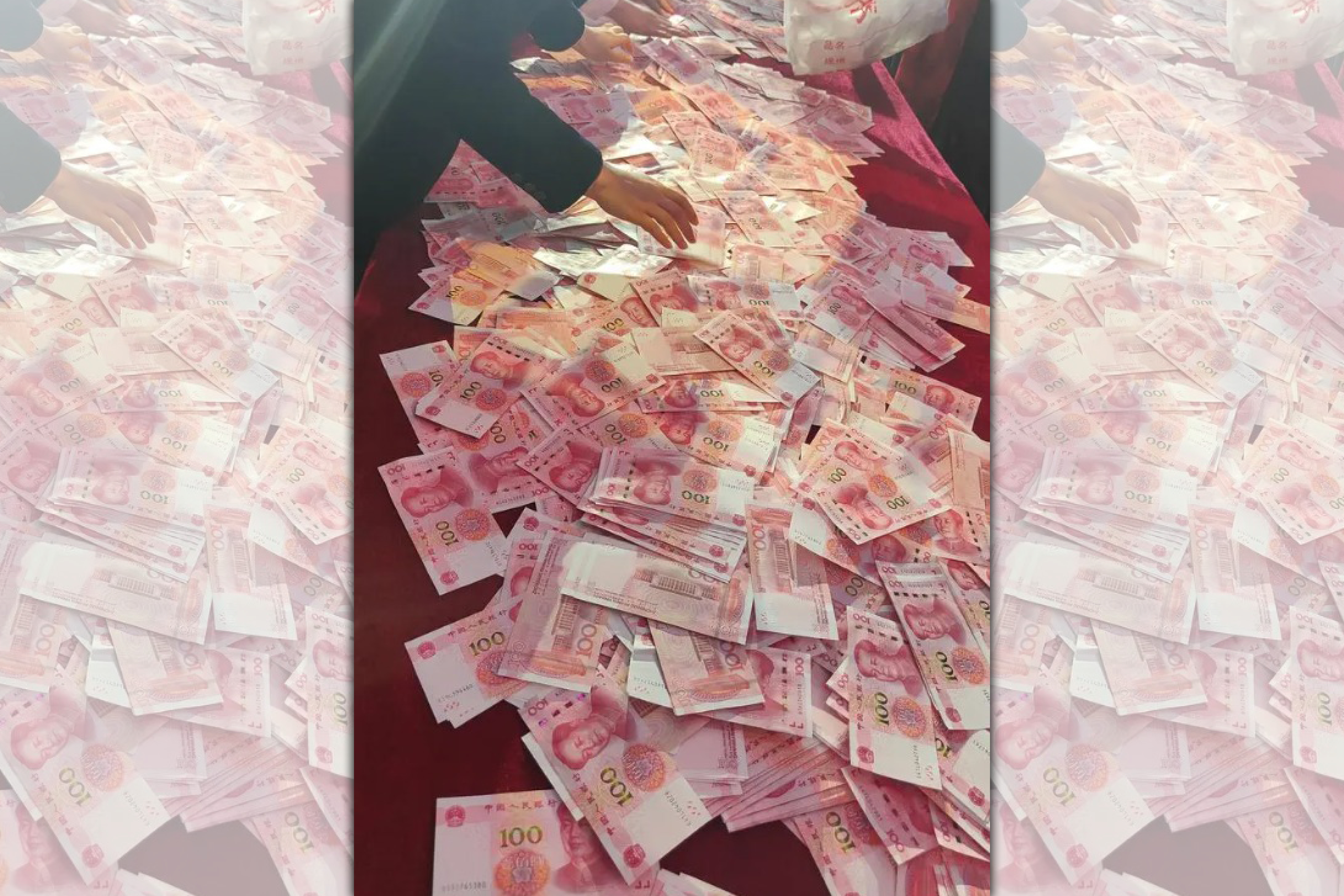 中國河南一間公司花大手筆，讓員工以「數錢」方式爭取獎金，共撒超過新台幣4.41億元。（翻攝自網路）