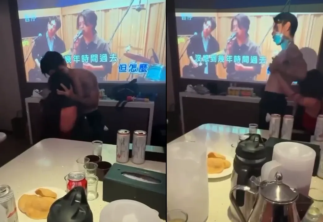 檢舉影片中可見女少校與男陪侍有貼臉、撫摸等親密舉動。（讀者提供）
