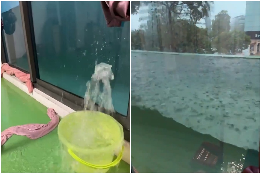 一名網友分享自家陽台淹水畫面，超大雨勢讓原本唯美的落地窗景觀，瞬間變成水族箱。（翻攝自推特）