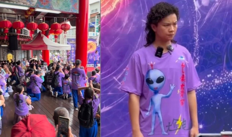 台東玄濟宮近日前往屏東參與遶境,現場出現大批身穿印有「外星人尬電」紫色制服的信眾,集體向一名自稱「濟顛禪師」的女子鄔馨茹(右)跪拜。(翻攝自臉書/霸告)