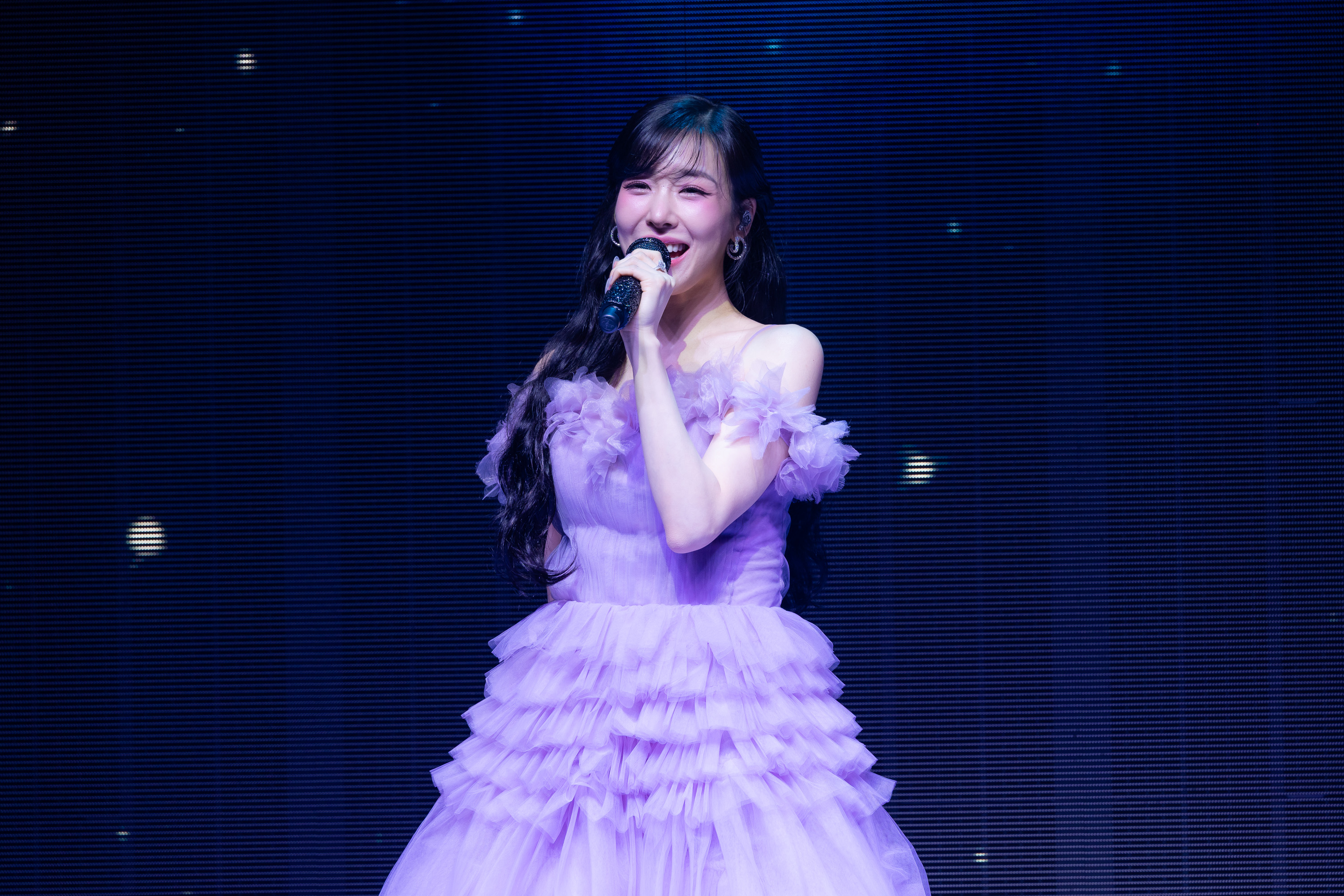 少女時代Tiffany今（12日）在台北舉辦見面會，開場淡紫色禮服像極了公主現身。（讀者提供）