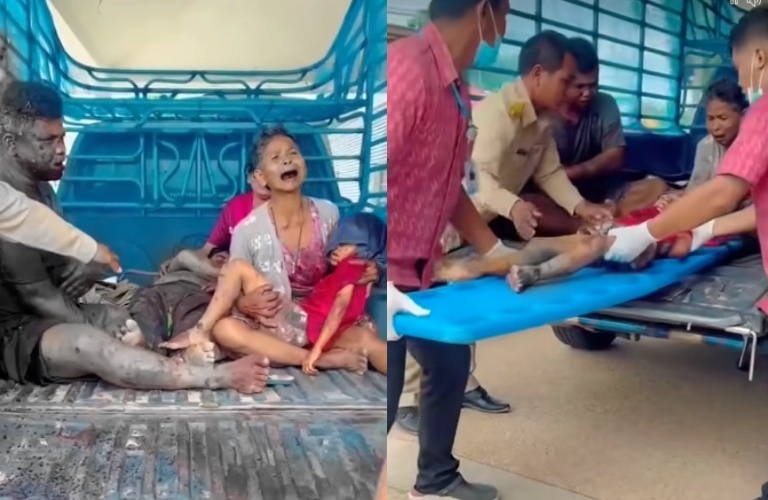 老婦人滿身血跡、抱著失去意識的孫子坐在貨車車斗，痛哭崩潰。（翻攝自Army Military Force – สำรอง）