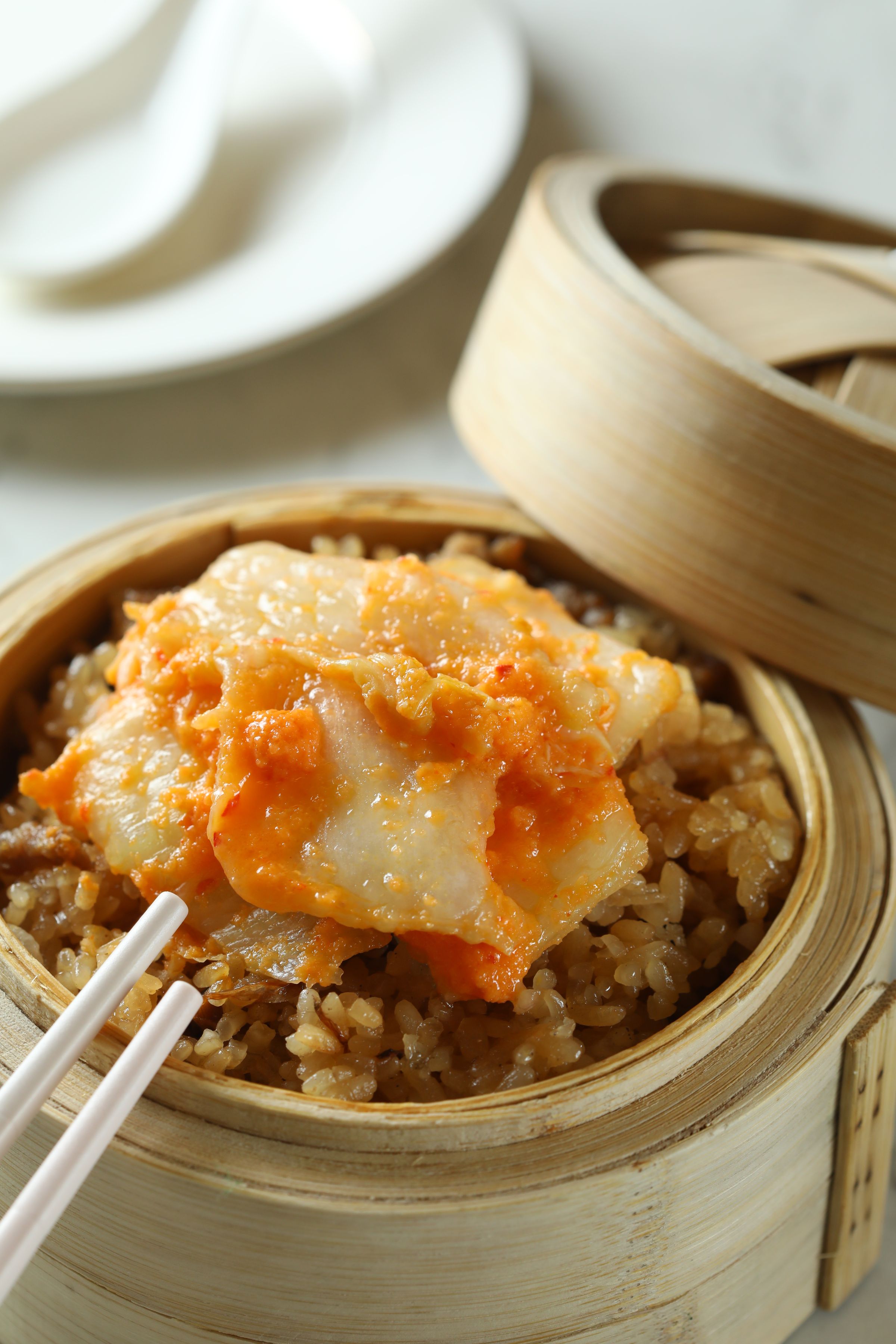 「辦桌ㄟ米糕」點睛之筆是上頭的黃金泡菜。（65元／份）