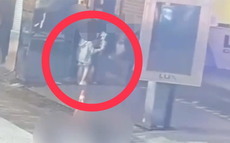 劉男與羅男(紅圈)為了女姓友人爭風吃醋,在西門町街頭爆發口角及肢體衝突。翻攝畫面