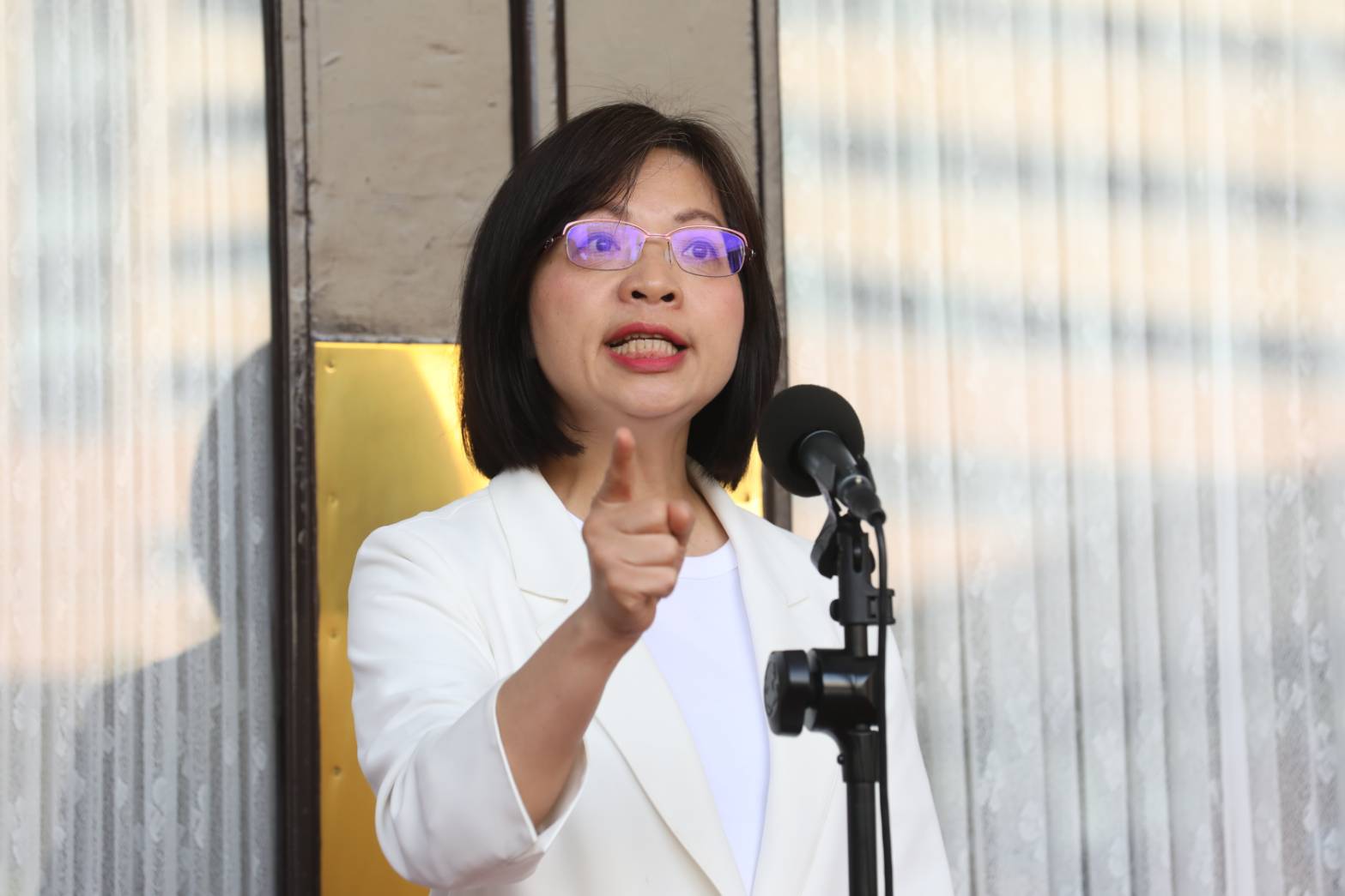 林淑芬和黃國昌為了三重果菜市場批發案是否遷移至蘆洲隔空互槓。