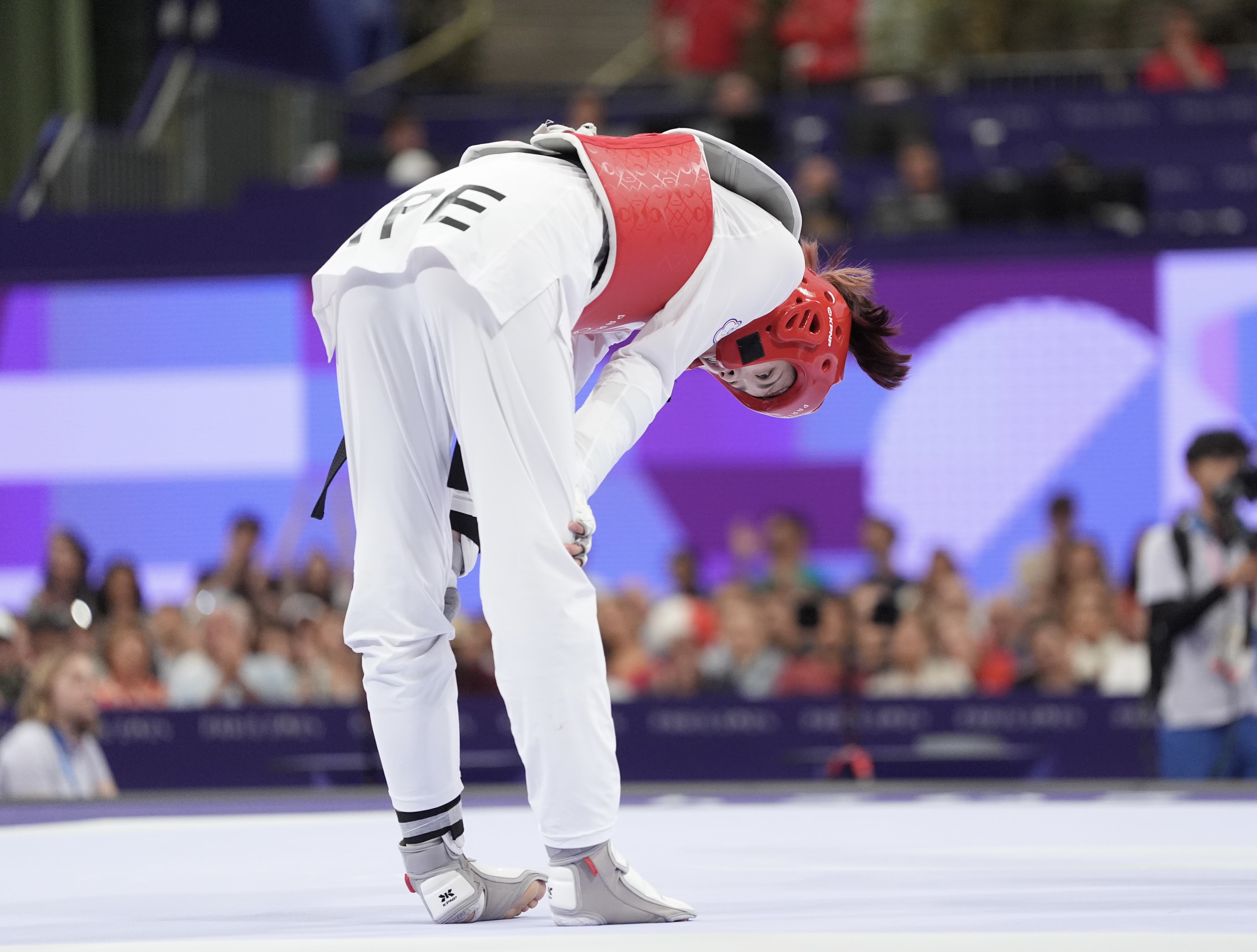 羅嘉翎帶傷上陣，可惜首輪就敗下陣，無緣晉級。（中華奧會提供）