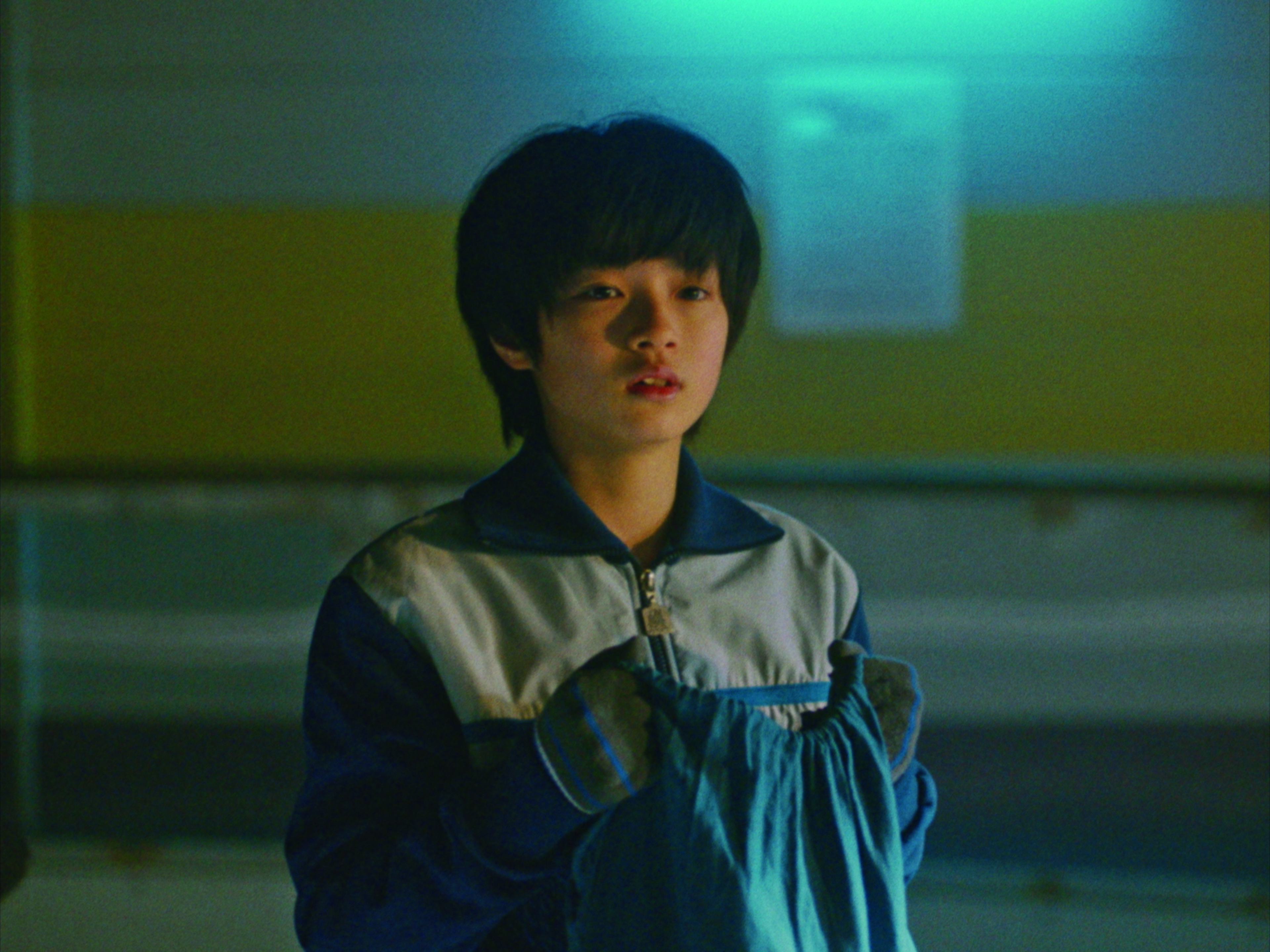 越山敬達在《我心裡的太陽》飾演有口吃的男孩,取材自導演奥山大史的兒時好友。(光年映畫提供)