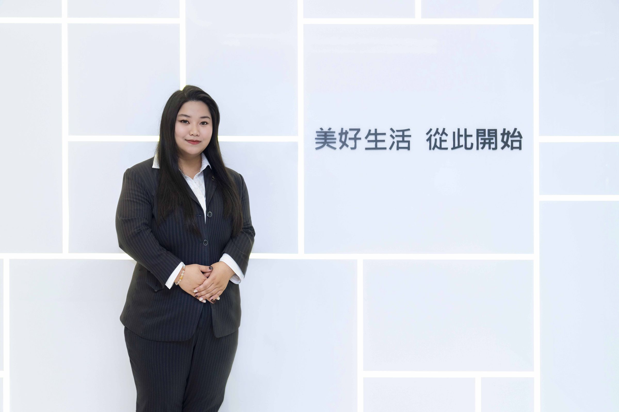 Z世代的陳奕伶在永慶房屋找到工作的成就感與價值,鼓勵年輕人勇於挑戰。