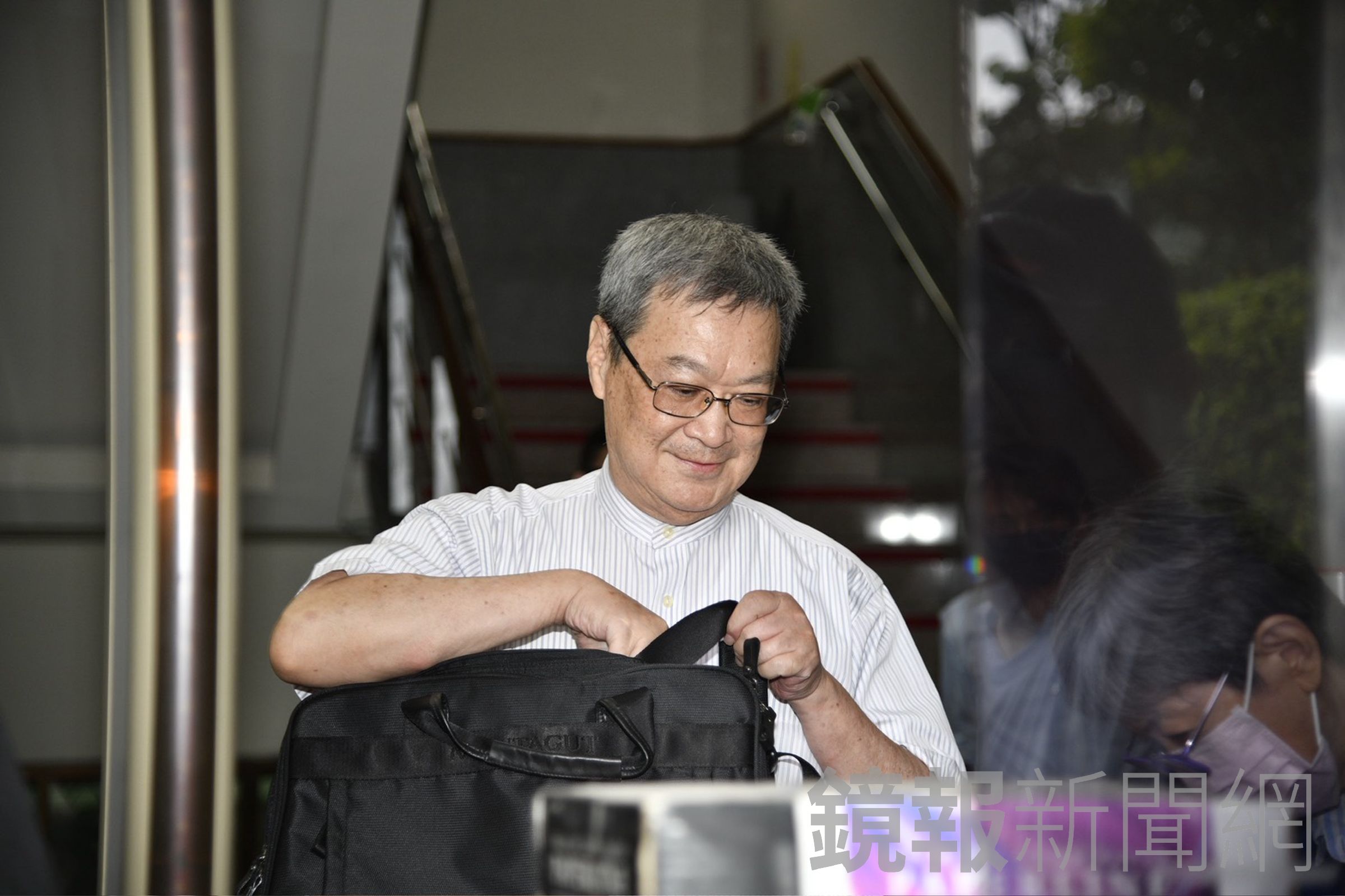 新光律師,黃訓章。(鏡報新聞網李智為攝)