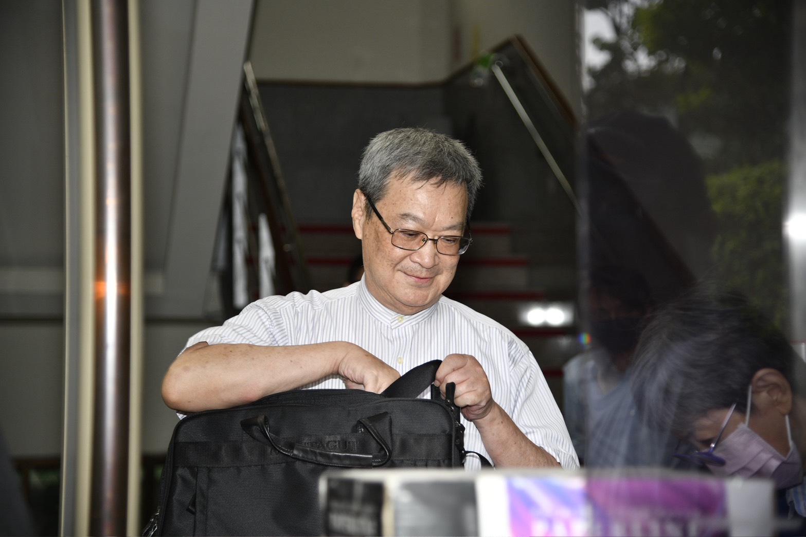 新光律師,黃訓章。(鏡報新聞網李智為攝)