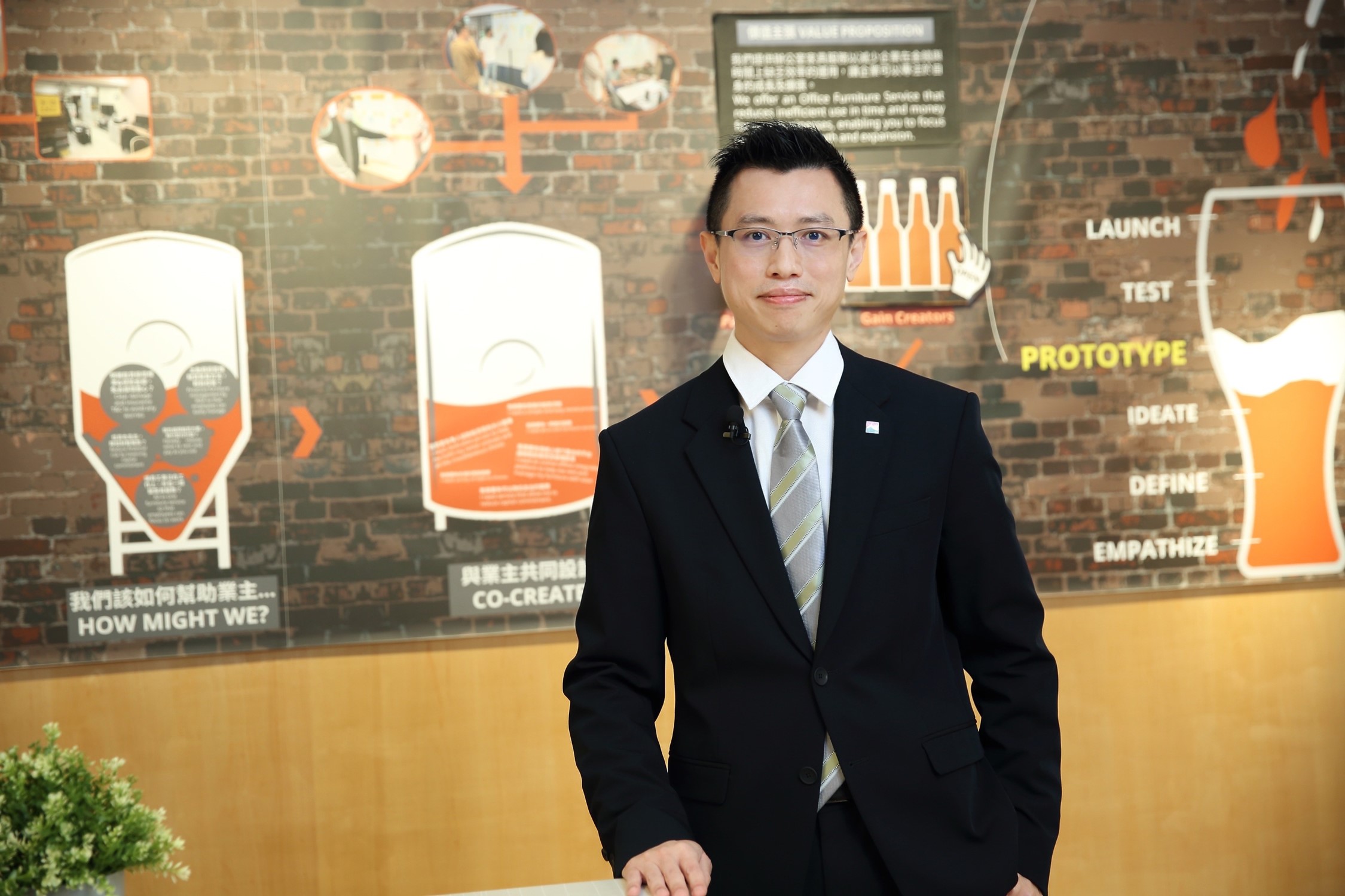 信義房屋憑藉自身導入AI的實務經驗分享，認為AI發展首要要讓「人」有感，包含客戶以及同仁，圖為信義房屋AI應用數據發展部部長張玄江。（信義房屋提供）