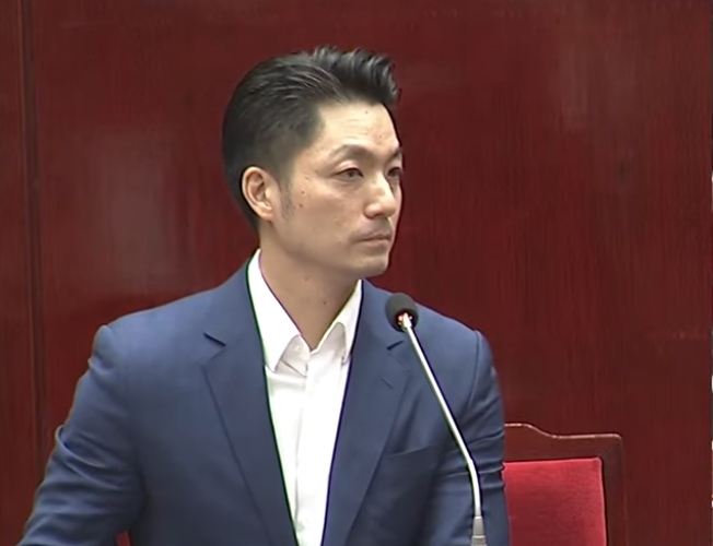 蔣萬安在報告的最後宣布輝達總部的好消息。（翻攝自YouTube@台北市議會）