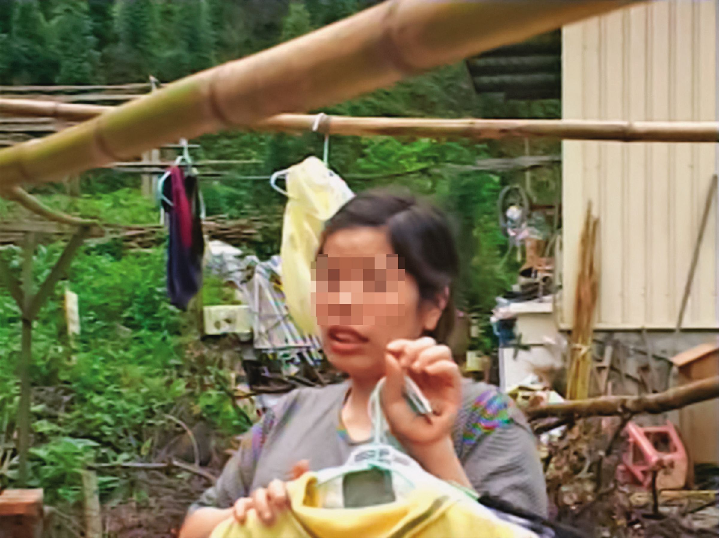 越南籍女移工(圖)目擊槍擊案,並試圖打電話報警。(東森新聞提供)