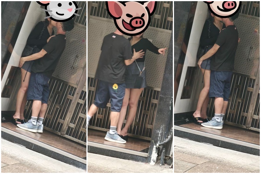 一對男女光天白日下，在尖沙咀某大廈外纏綿。（翻攝自香港論壇）