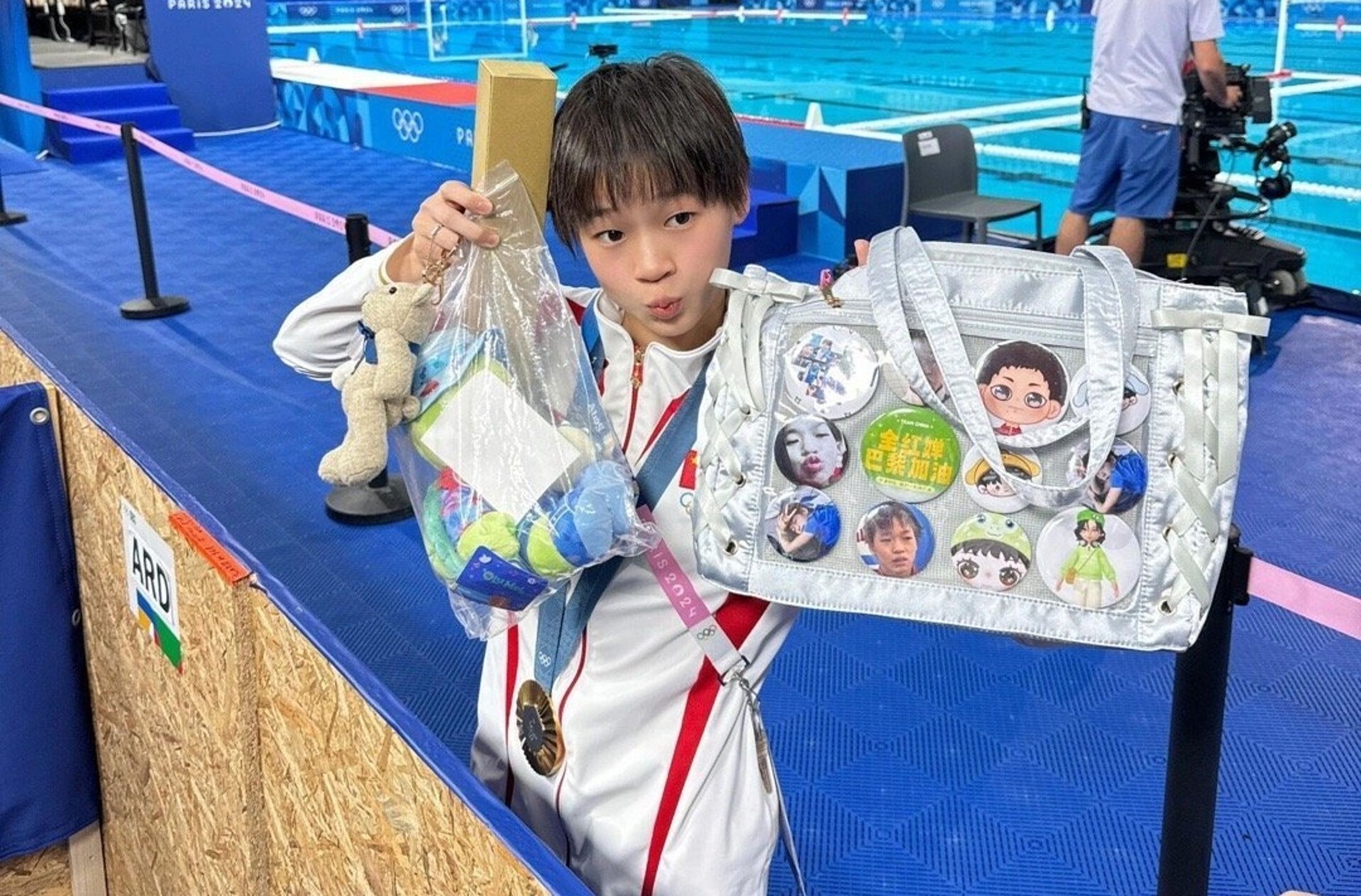 17歲中國跳水好手全紅嬋在本屆奧運表現亮眼,靠著驚人的「水花消失術」,勇奪2面金牌。(翻攝自微博)