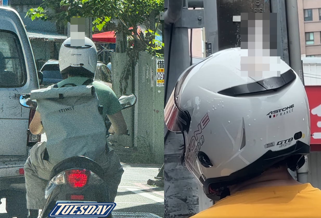 一名男機車騎士在安全帽上黏了一根「姊夫」，被目擊的路人拍下來上傳網上熱議。（翻攝臉書社團「路上觀察學院」）