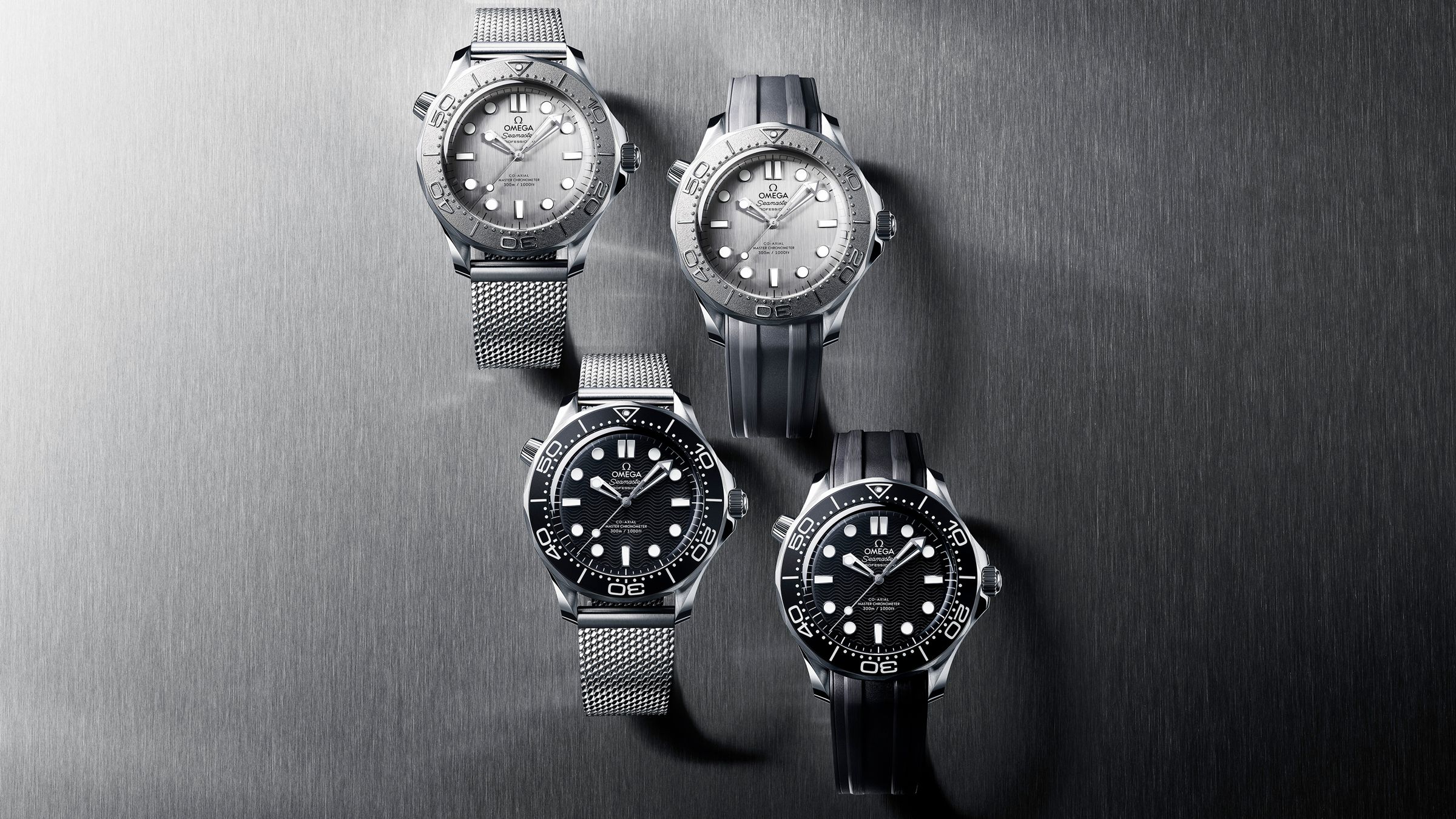 OMEGA推出新版Seamaster Diver 300M，一改過去系列常見的陶瓷材質，以金屬錶圈和錶面為主軸，推出兩種顏色分別搭配橡膠錶帶和米蘭帶的四種版本。定價 NT$196,000（橡膠錶帶）、NT$215,000（米蘭帶）