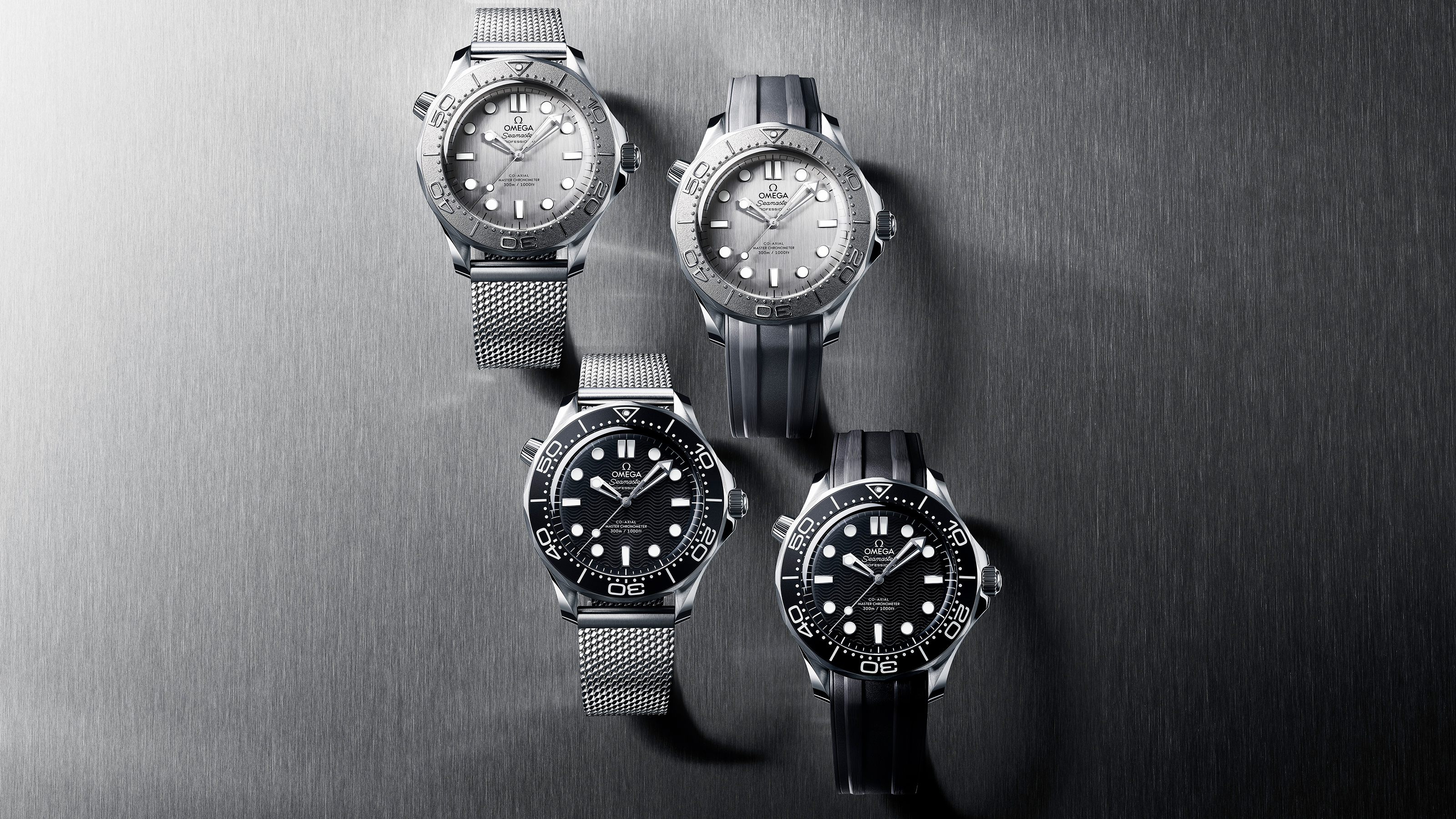 OMEGA推出新版Seamaster Diver 300M，一改過去系列常見的陶瓷材質，以金屬錶圈和錶面為主軸，推出兩種顏色分別搭配橡膠錶帶和米蘭帶的四種版本。定價 NT$196,000（橡膠錶帶）、NT$215,000（米蘭帶）