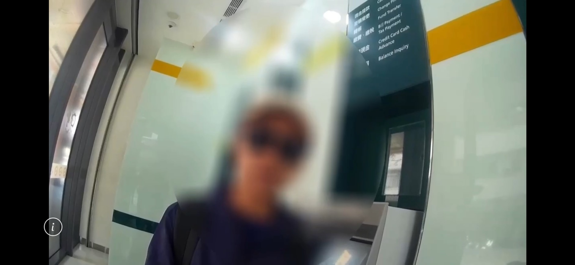 梁女刻意戴鴨舌帽及墨鏡遮掩面容領款。警方提供
