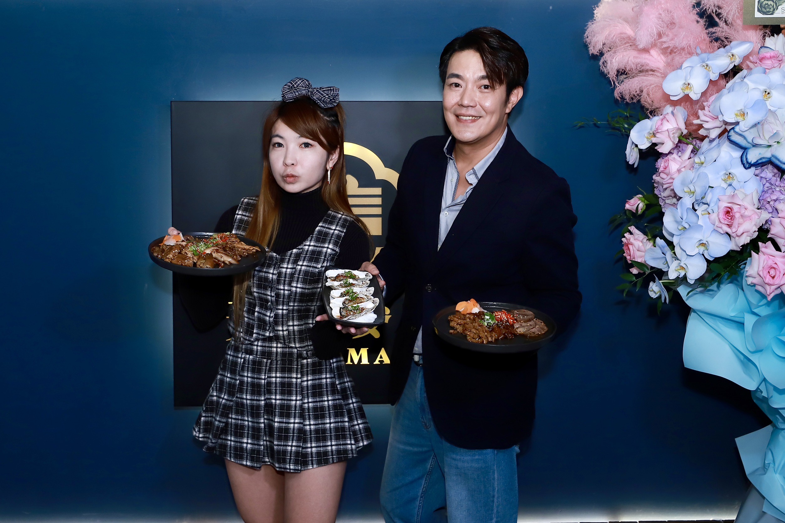 「美喝麥喝」大股東彭羽溱（左）、余政鴻。（民視提供）