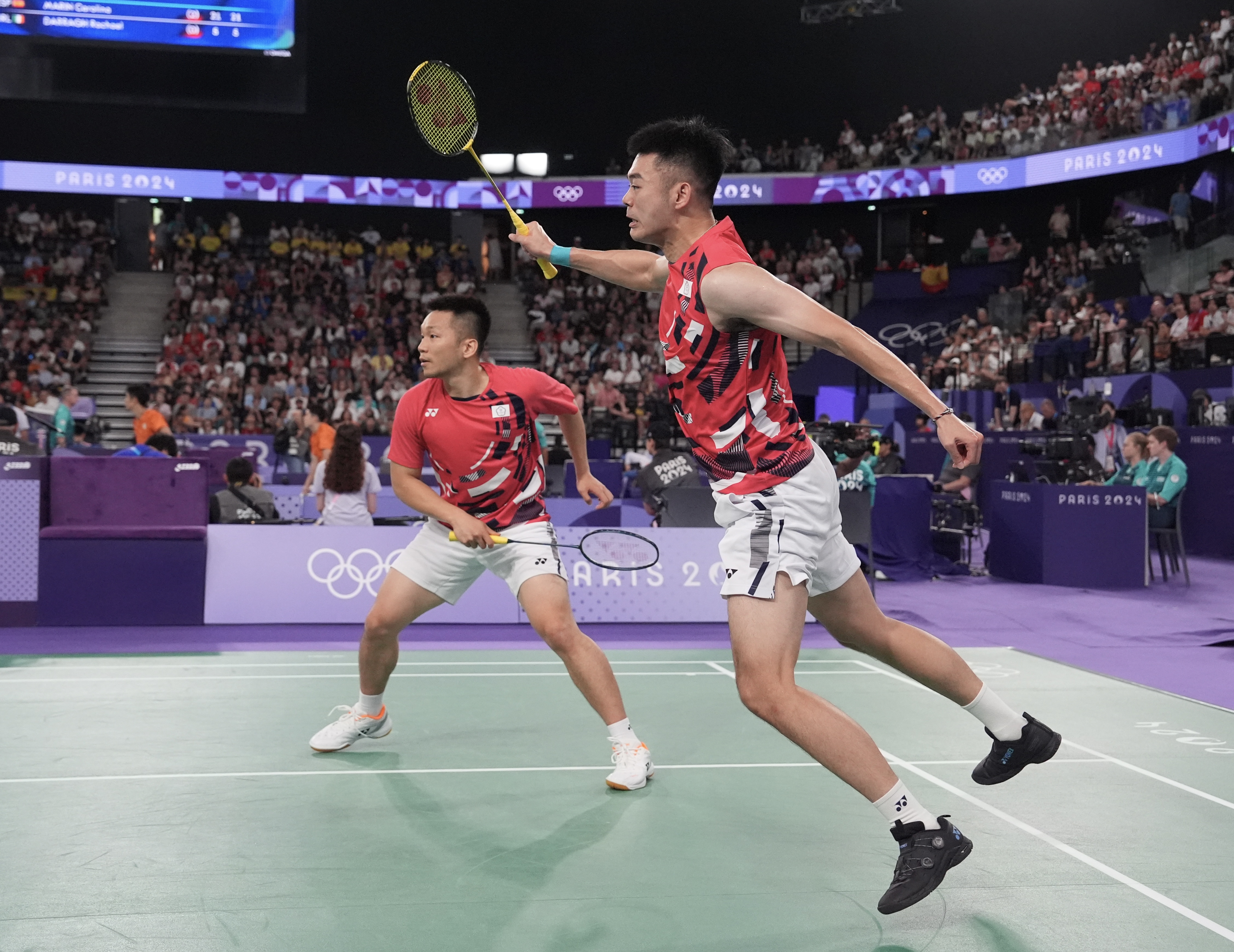 「麟洋配」王齊麟與李洋今日對上泰國組合。（中華奧會提供）