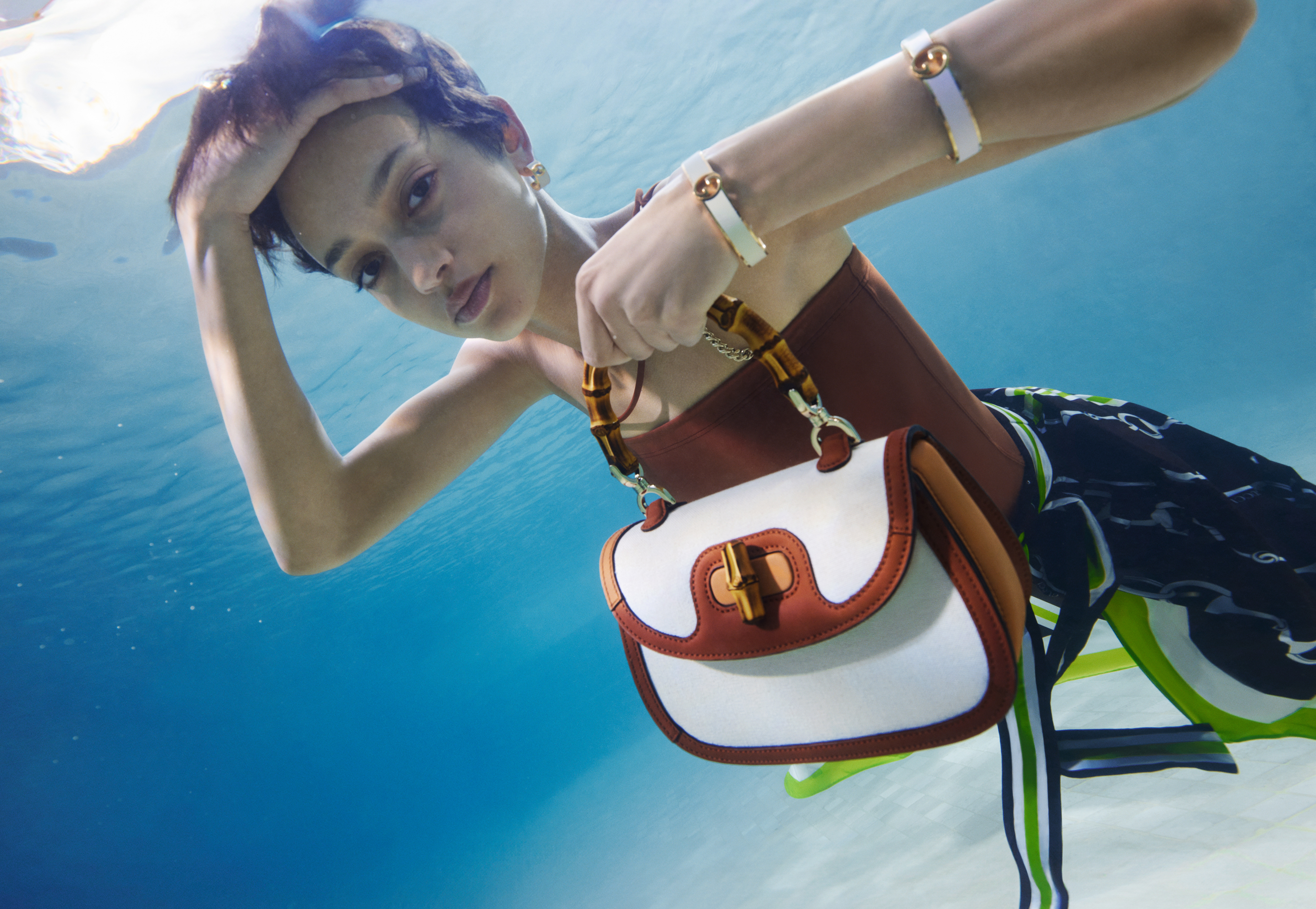 GUCCI Lido夏日度假系列全新形象廣告。（古馳提供）