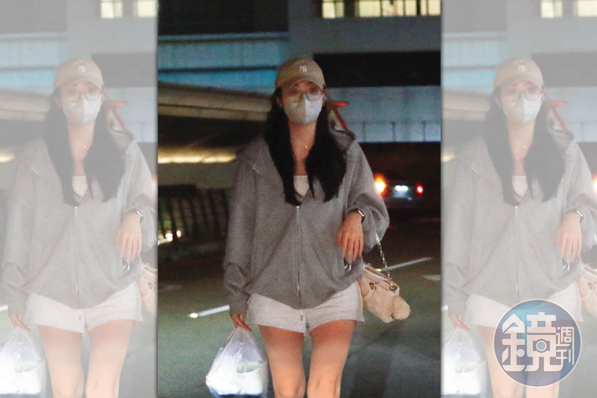 4月5日23：24，身休閒裝戴著帽子、眼鏡與口罩，大素顏的Cindy忽然下車，手提一袋食物。