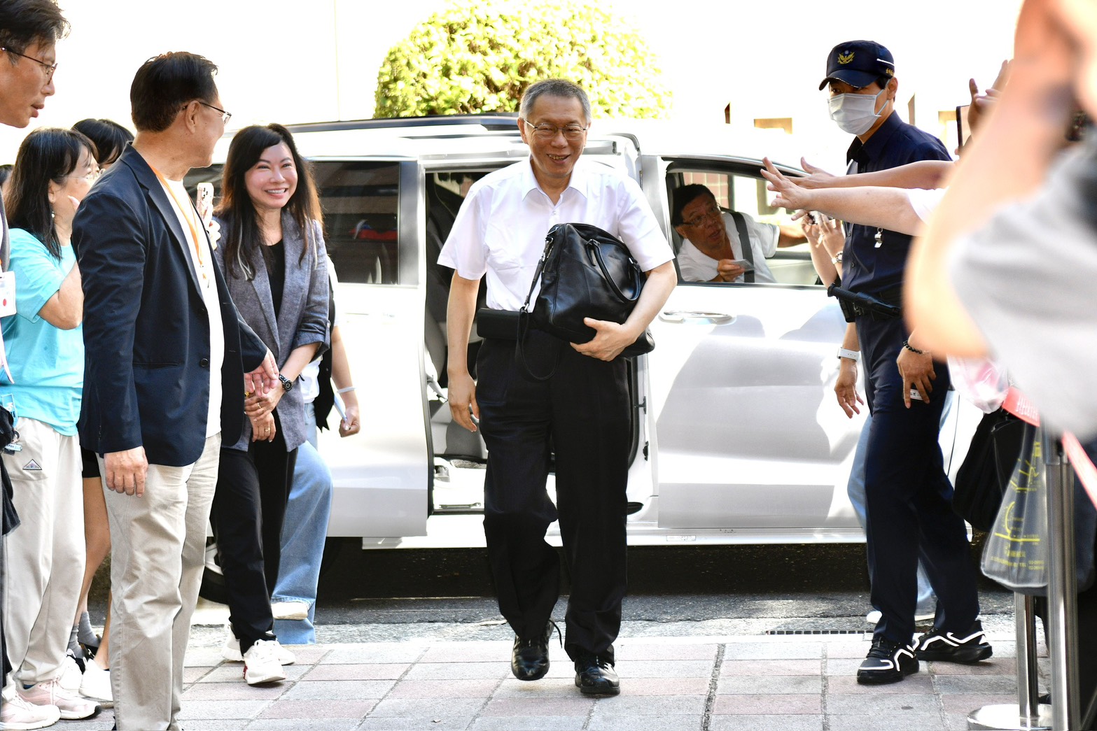 民眾黨前主席柯文哲出庭表示，橘子只管小錢，但有拉走妙天1000萬元。（鏡報李智為）