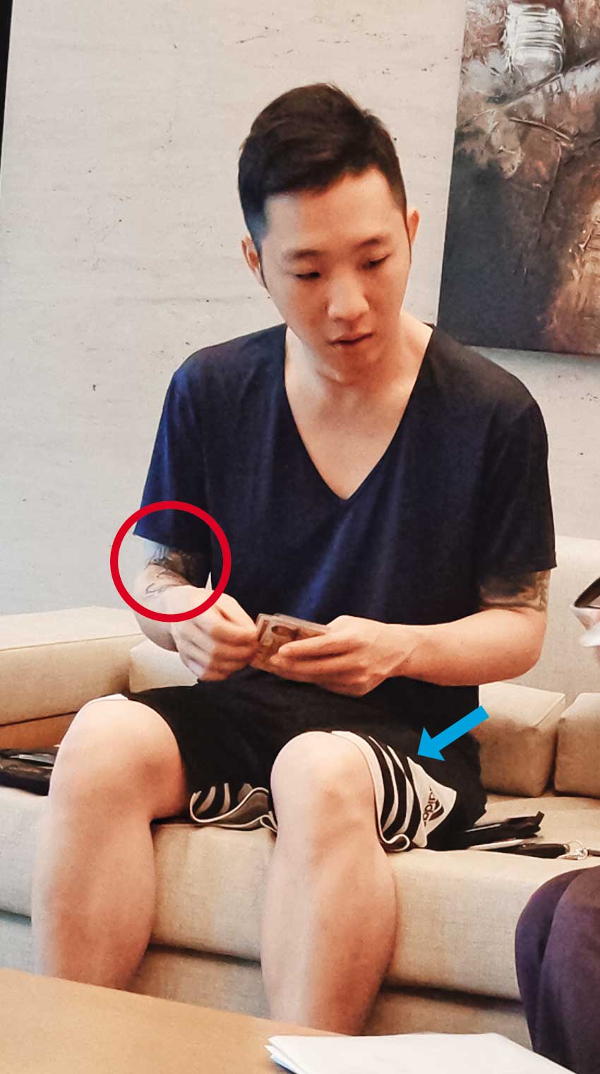 劉男時常穿著1件黑色條紋短褲，手上紋有特殊的刺青（紅圈處）。（當事人提供）