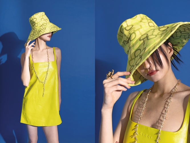 皮革洋裝 NT$137,900 by GUCCI / 黃色印花帽子 NT$25,600 by GUCCI / Jardin De DIOR花朵戒指 NT$19,500 by DIOR / Jardin De DIOR長項鍊 NT$120,000 by DIOR