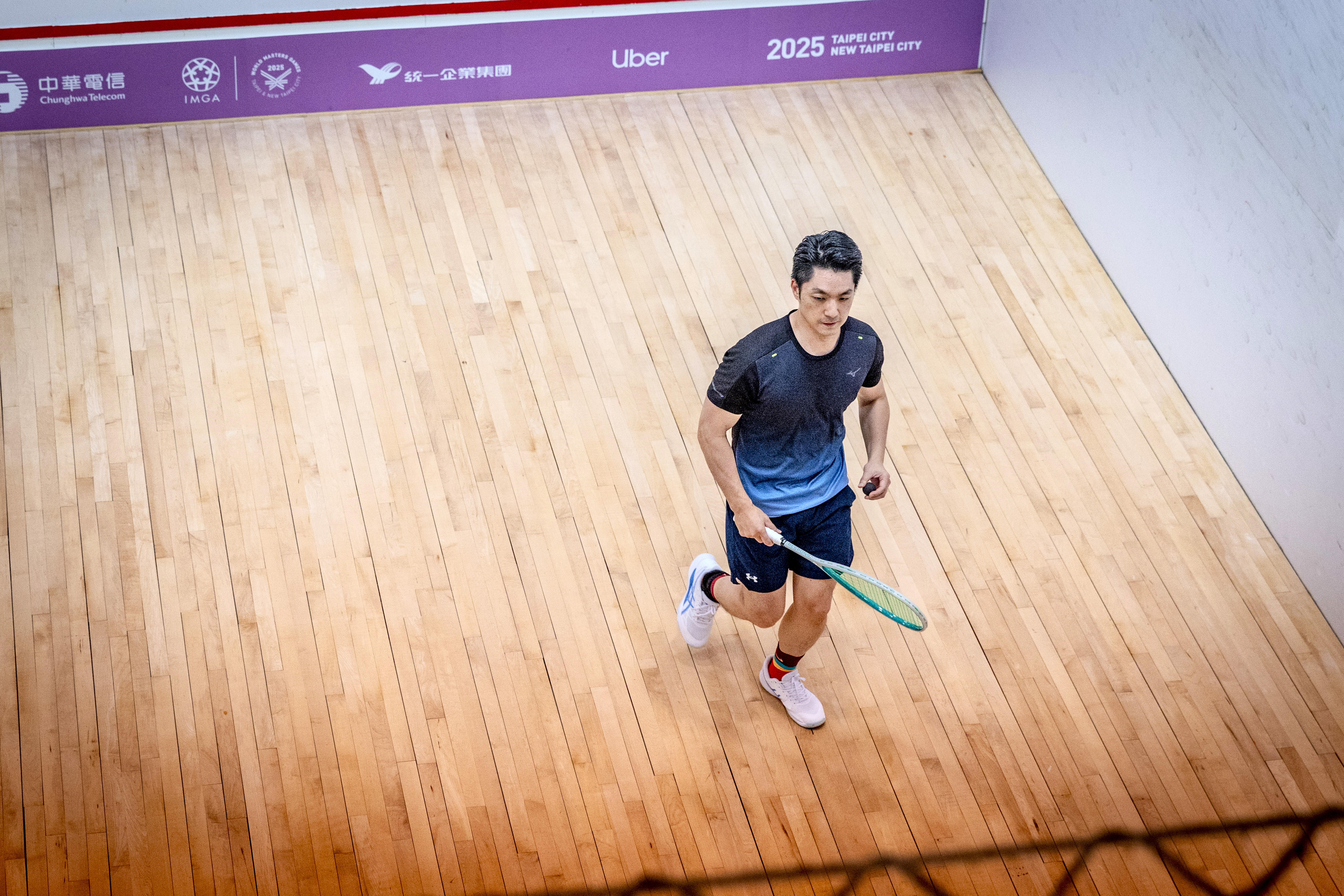 蔣萬安參加世壯運壁球項目，止步第二輪。（本刊資料照）