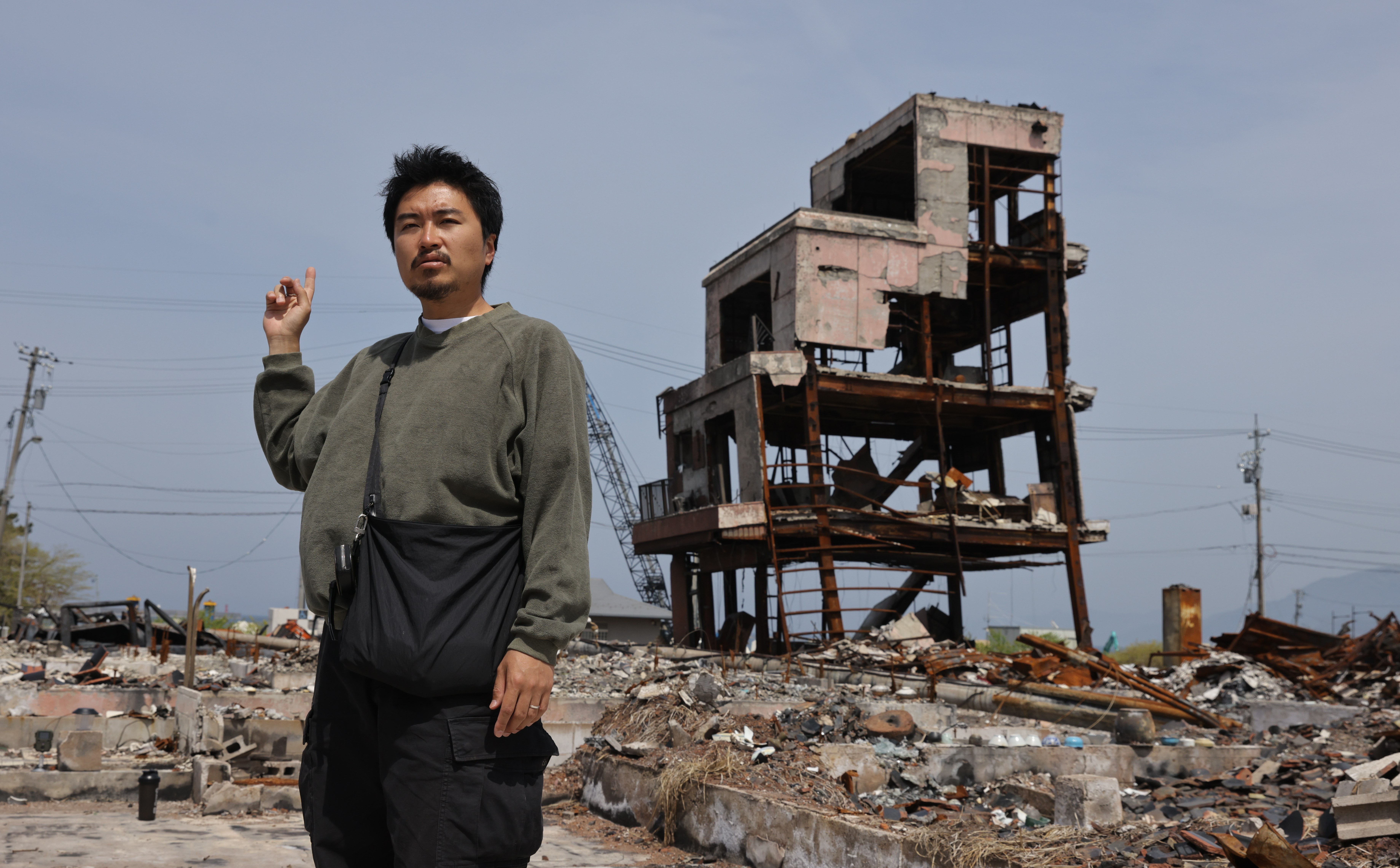 桐本滉平堅守家園,希望重建之路早日完成。