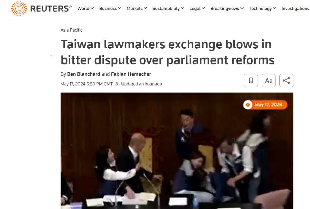 路透社報導台灣立法院議場衝突。（翻攝自路透社網站）