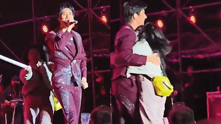 王力宏在大陸臨沂演出時，突然有一名長髮女子衝上台還熊抱他。（翻攝自微博）